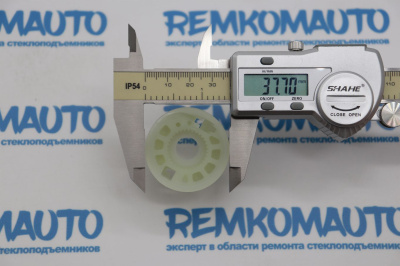 Ролик (катушка) стеклоподъёмника BMW/Saab/Seat/VW левый 770044