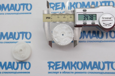 Комплект шестерен замка двери BMW (2 шт.) (перед. лев.) 771513