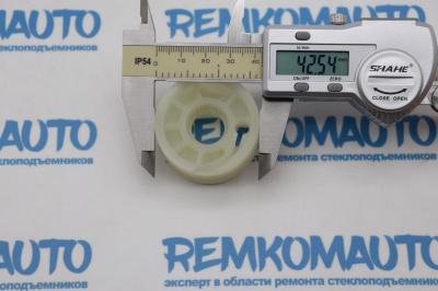 Ролик (катушка) стеклоподъёмника Volkswagen правый 770066