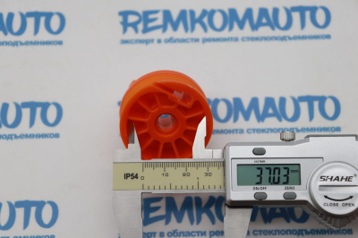 Ролик (катушка) стеклоподъёмника левый 770429