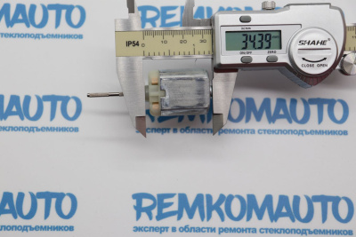 Моторчик (двигатель) центрального замка передней правой двери 772736 Моторчик (двигатель) центрального замка передней правой двери 772736